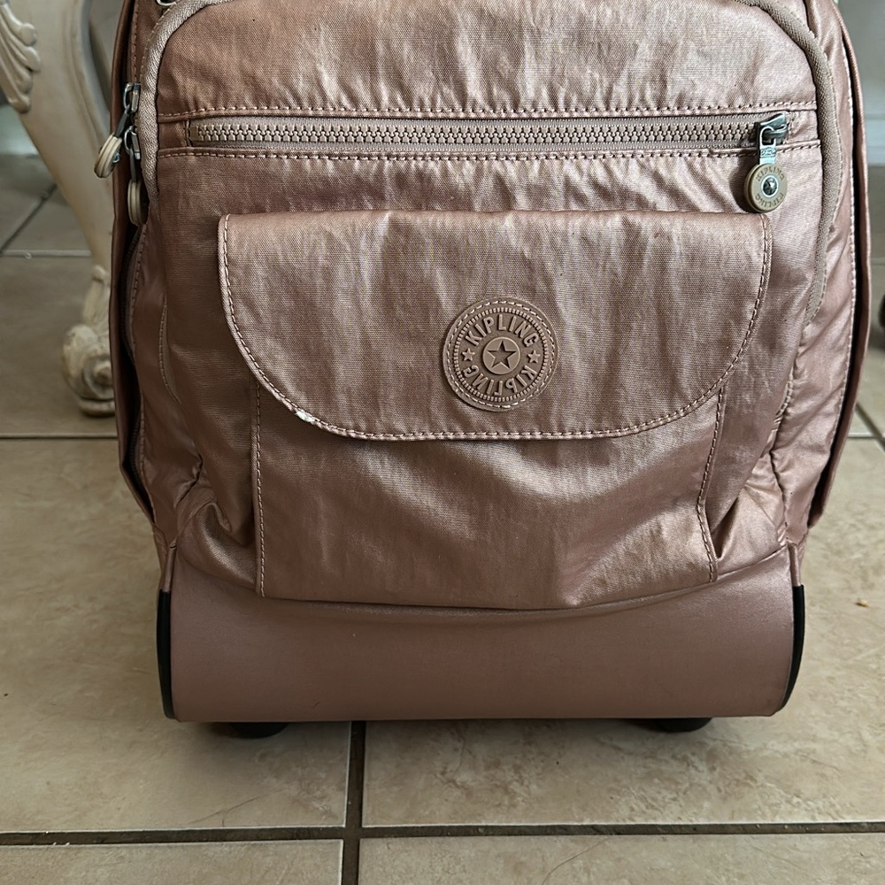 Kipling Shimmering Rose Rolling Backpack